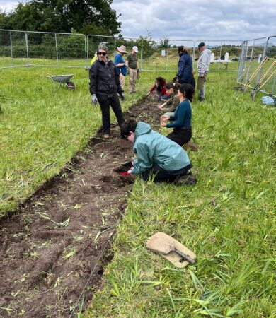 students-excavating-trench-green-fort-ireland